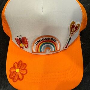Truckers Hat womans homemade orange with patches (rainbow flower)